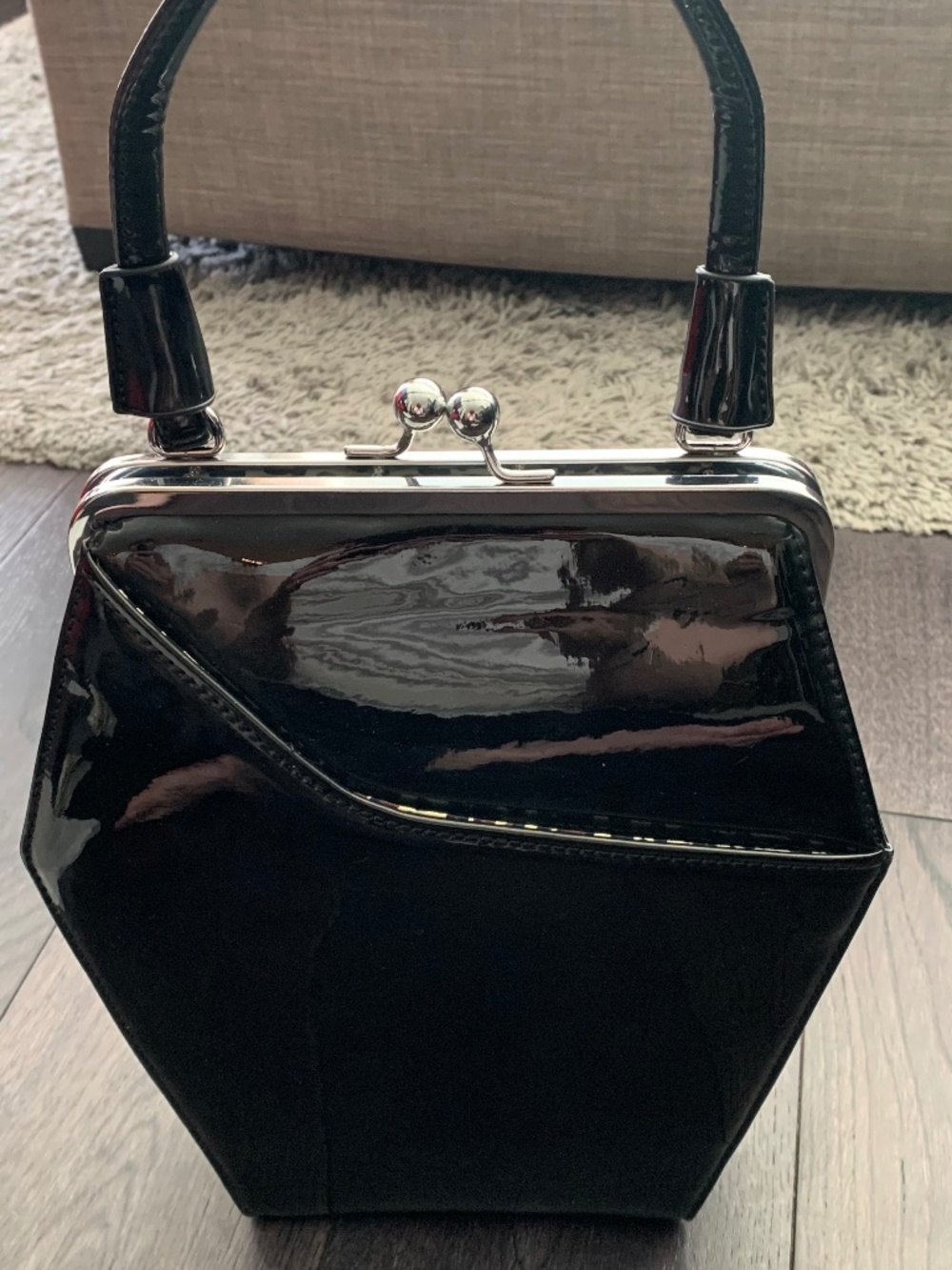 Coffin shaped black vinyl purse